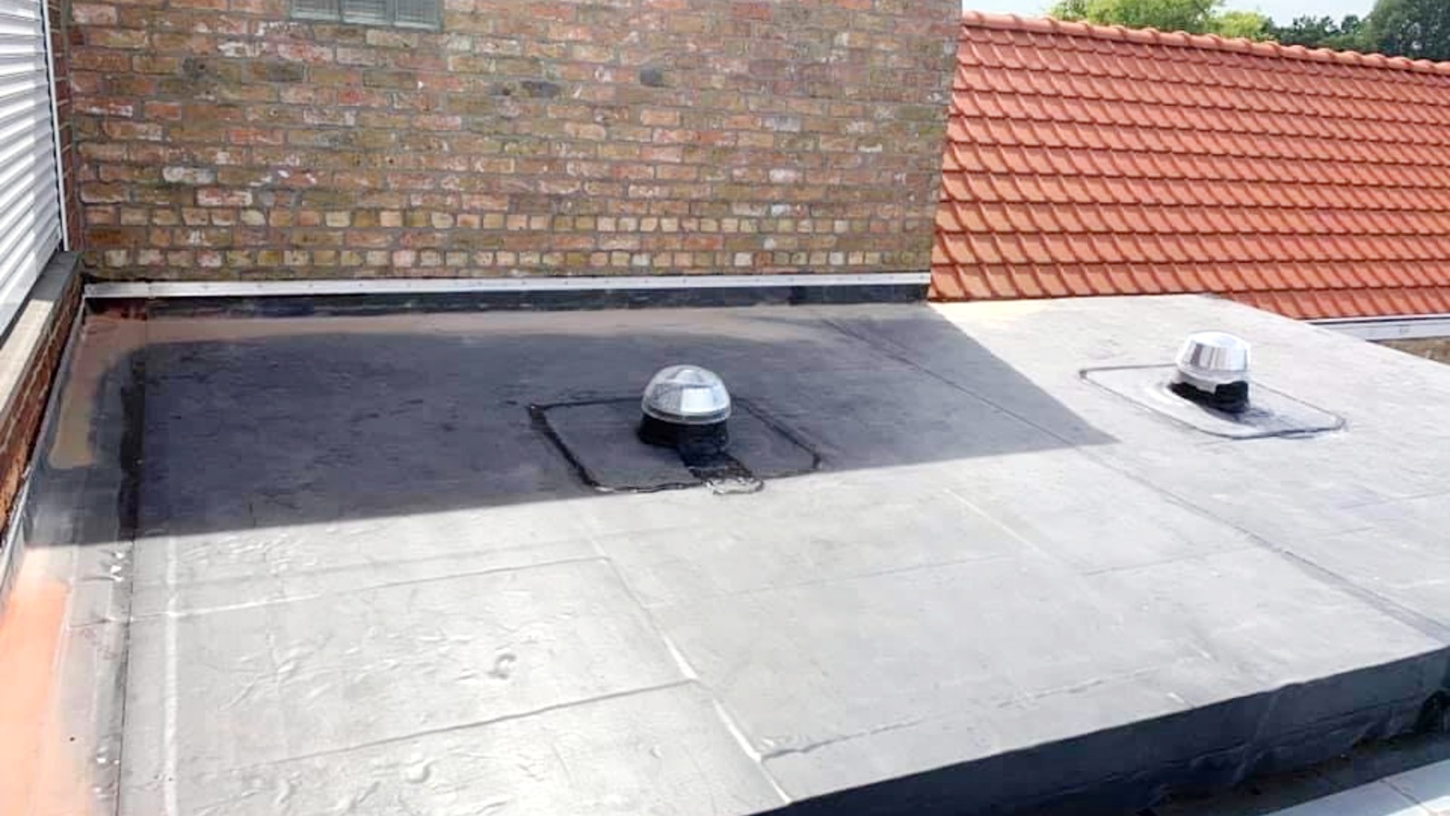 Roofing bitumen plaatsing